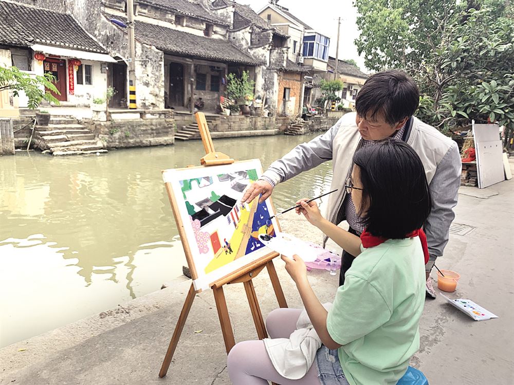 画出"我眼中的美丽乡村《吴江日报》